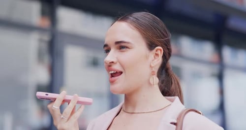 Woman Using Voice to Text on Cell Phone