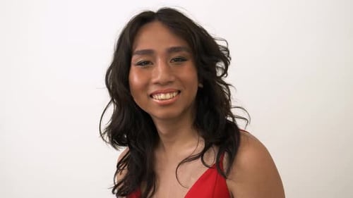 Studio Portrait Confident Happy Transgender Female Flipping Hair 10 Seconds or Greater