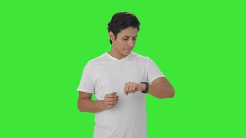 Anxious Indian man waiting for someone Green screen
