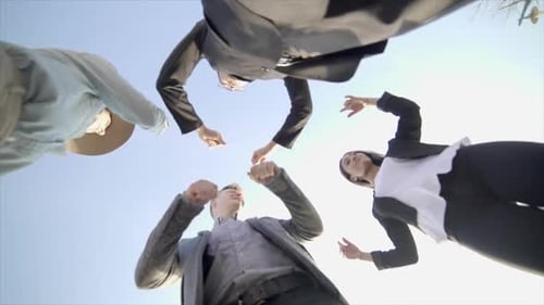 Team of Professionals Cheerfully Collaborate Together