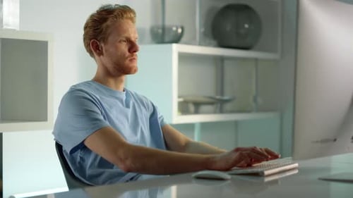Focused Manager Surfing Web At Workplace Closeup. Ginger Man Checking Data. Thoughtful Freelancer...