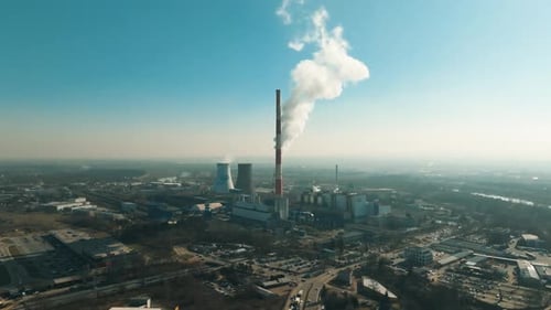 Coal power plant emits smoke into the atmosphere