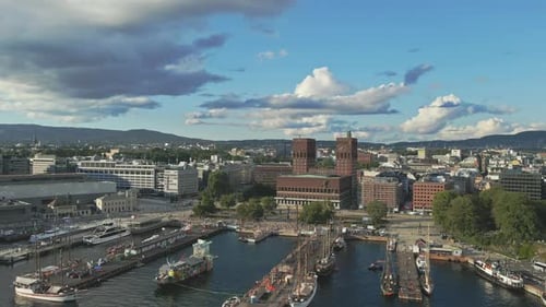Flying over the docks in Pipervika toward the city of Oslo Norway