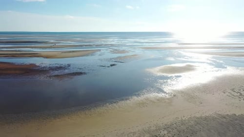 Beautiful Cape Cod Bay Aerial Drone Footage of Bay Side Beach at Low Tide with People, Sand Dunes an