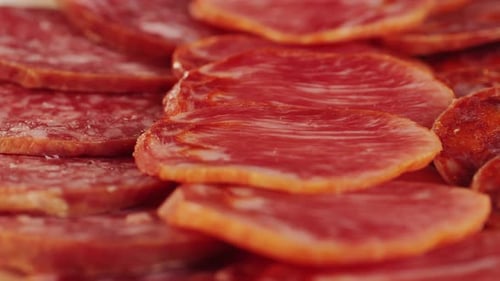 Mix of Spanish Pork Sausages Cutting Board of Appetizing Catalonian Snack Fuet Jamon Chorizo Olives