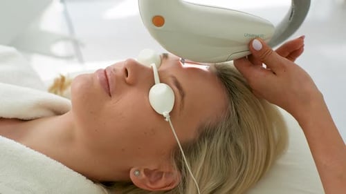 Woman Receiving Intense Pulsed Light Facial Treatment