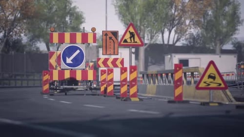 Construction Site with Traffic Signs and Barriers on a City Road