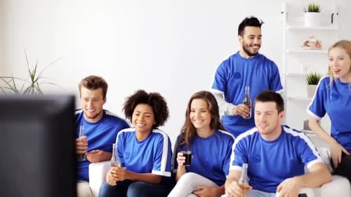 Friends Cheering and Toasting in Living Room