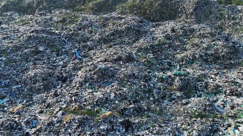 Aerial View of Large Landfill with Piles of Garbage