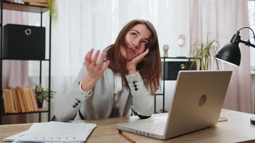 Tired Sleepy Young Businesswoman Sitting at Home Office Desk with Laptop Overworked Lazy Bored
