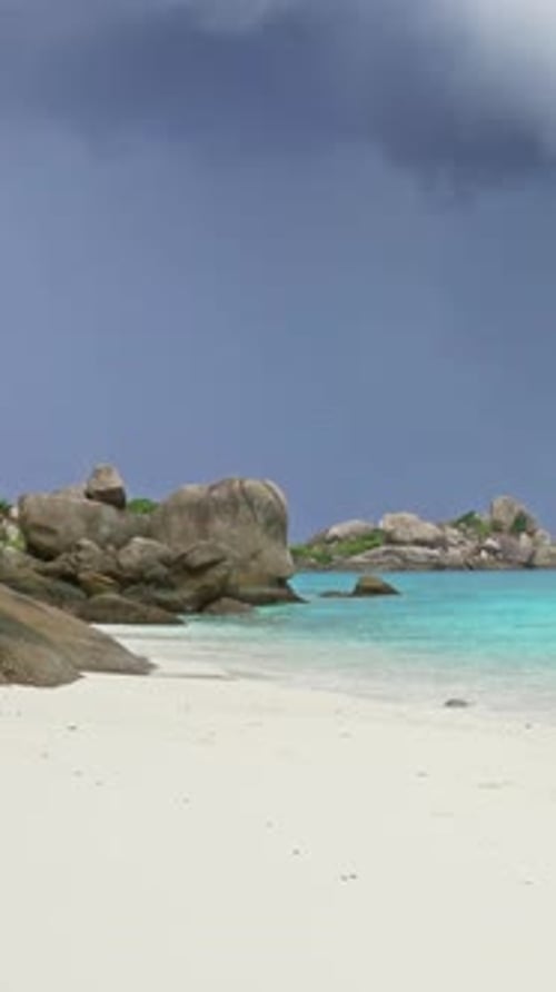 White sand beach and storm sky on Similan islands