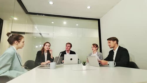 Meeting, documents and business people in office for report for planning, finance review or analysis