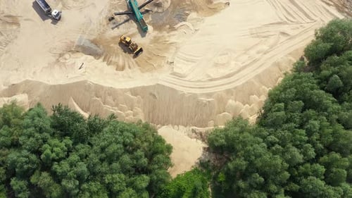 Aerial view of the sand quarry with heavy equipment