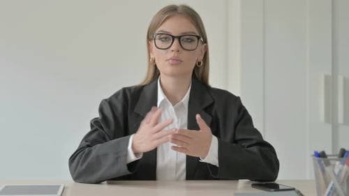 Blogging Young Businesswoman Talking in Camera