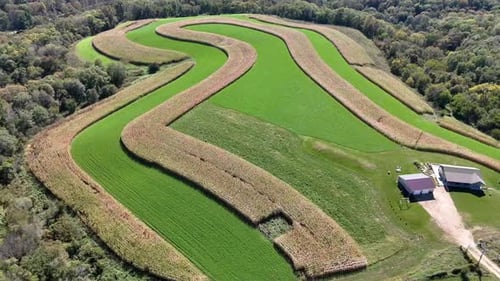 Contour Farming is a practice that involves performing farming across a field's slope. This includes