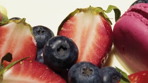 Fruit Cake Decorated with Berries and Macarons