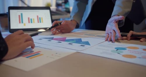 Business Colleagues Meeting To Discuss Data