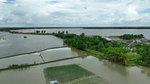 Agricultural fields, homes, roads submerged in flood, Satkhira region, Bangladesh, Aerial