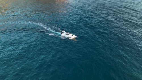 Sports Boat Sails and Makes Beautiful Turns Aerial View 4 K