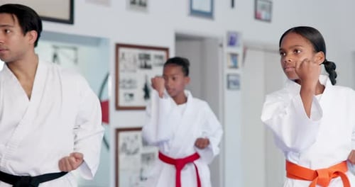 Karate Students Practicing Martial Arts Skills