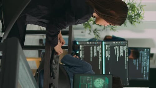 Programmers Typing Code in Office with Critical Error