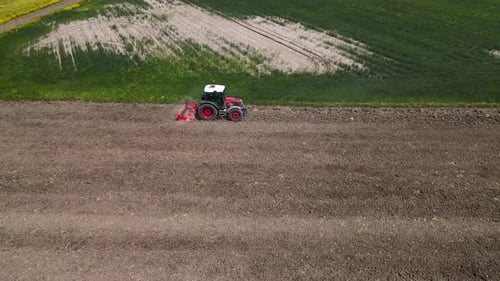 Tractor Ploughed Field For Planting