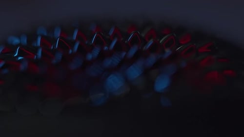 fluid forming spikes in a dark abstract atmosphere