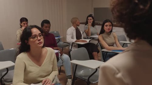 Female Students Participating in a Classroom Lesson at College