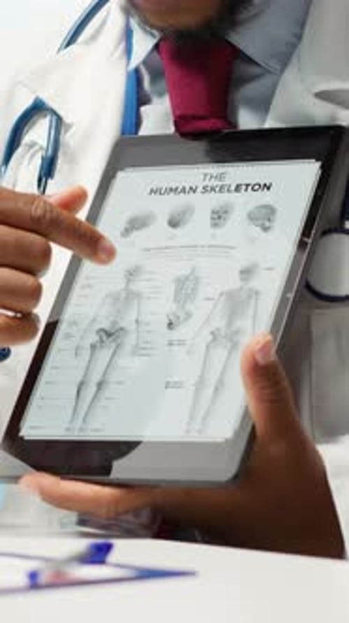 Doctor Explains Human Skeleton Using Tablet