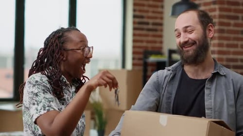 Diverse Married Couple Getting House Keys to Move in