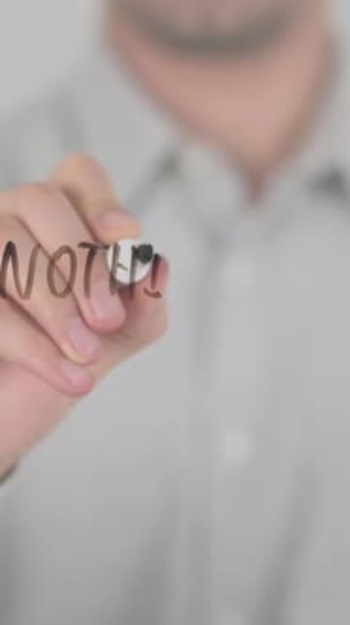 Adult Writes Nothing is Impossible on Glass Surface