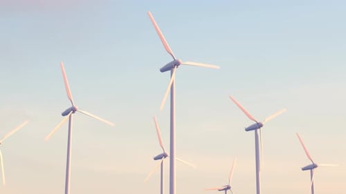 Eine Szene moderner Windturbinen, die sich bei Sonnenuntergang sanft drehen, in einer realistischen 3D-Animation
