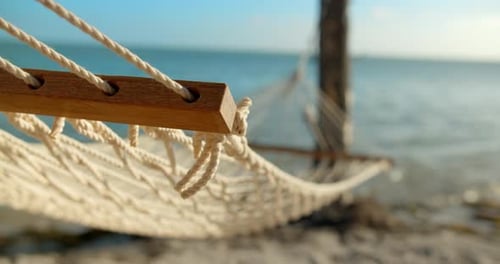Close Up, Hammock on Tropical Beach with Ocean Behind