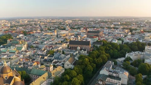 Beautiful View of Drone Flying Over Krakow's Old Town during Summer Sunrise