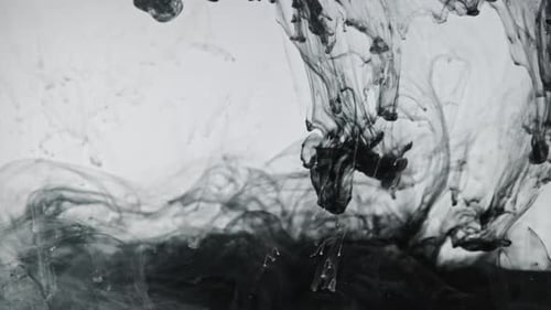 Mesmerizing Black Ink Swirling in Clear Liquid
