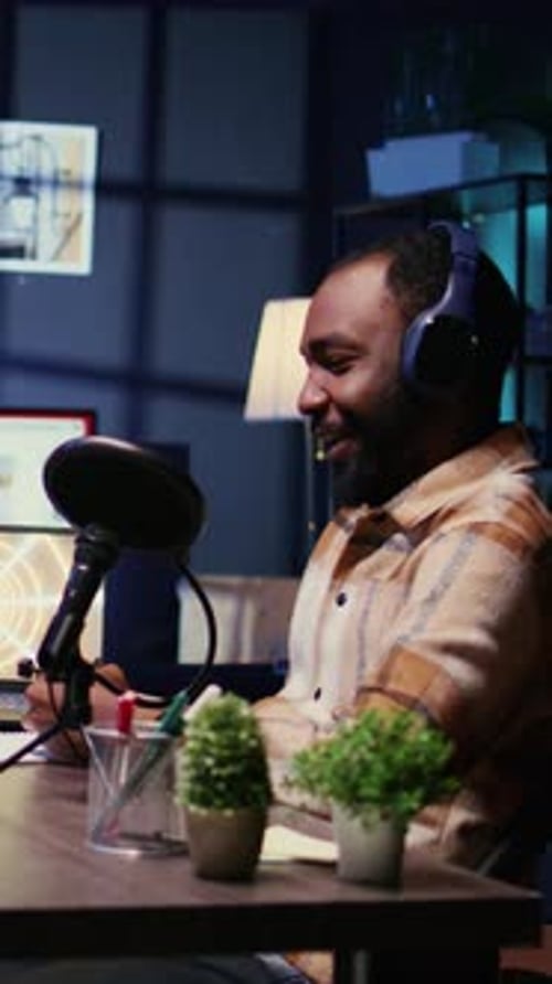 Young Adult Recording a Podcast in Studio