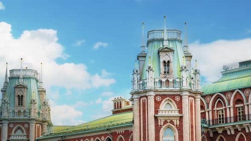 A red-white palace in the style of neo-Gothic style.