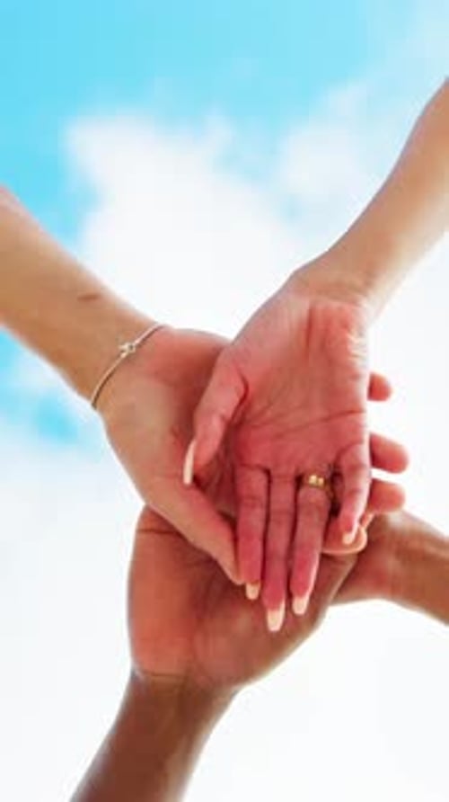 People, huddle and hands together with team in nature for community mission or collaboration below
