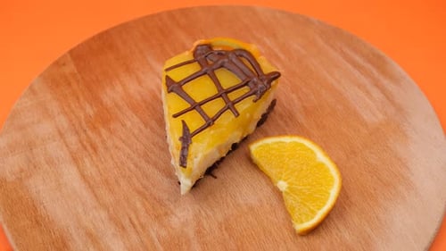 Delicious Orange Cake with Chocolate Drizzle on Board