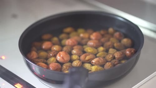Boiling plum fruits removed from plum syrup