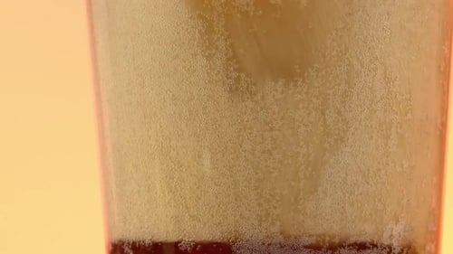Soda Being Poured Into Glass