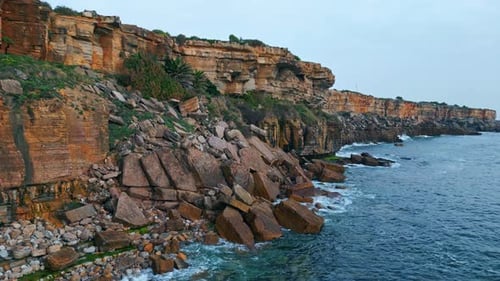 Drone View Rocky Seaside Scenery Serene Sea Waves Breaking Coastline Cliffs