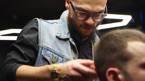 Barber Giving Haircut in Modern Urban Barbershop