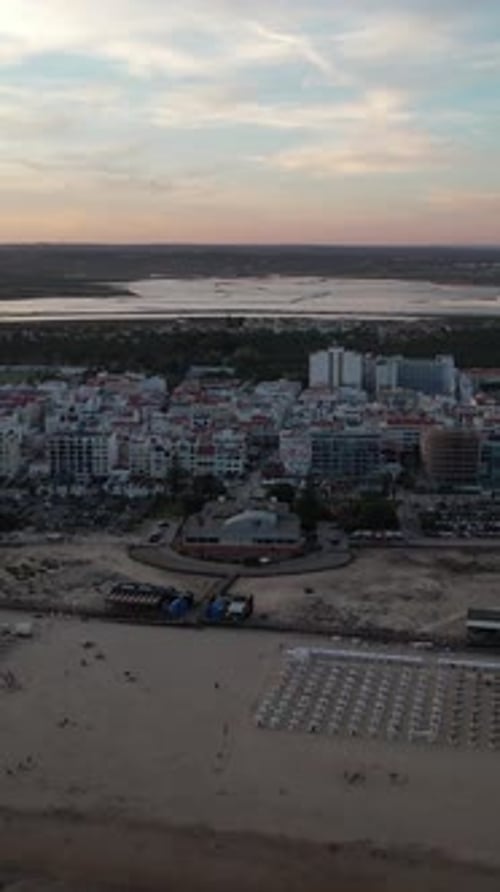 Vertical Video of sunset on the beach in Monte Gordo. Algarve, Portugal