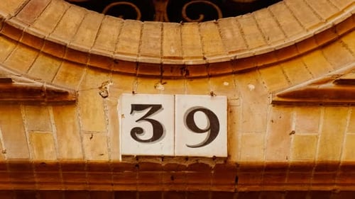 Number 39 (thirty-nine) Affixed to a Building