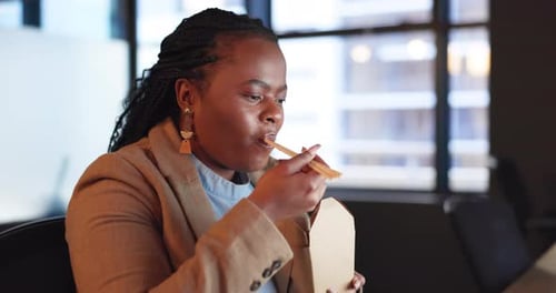 Office, fast food and business woman with takeout at desk for lunch break