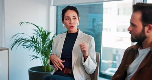 Team Discussing Business in Modern Office