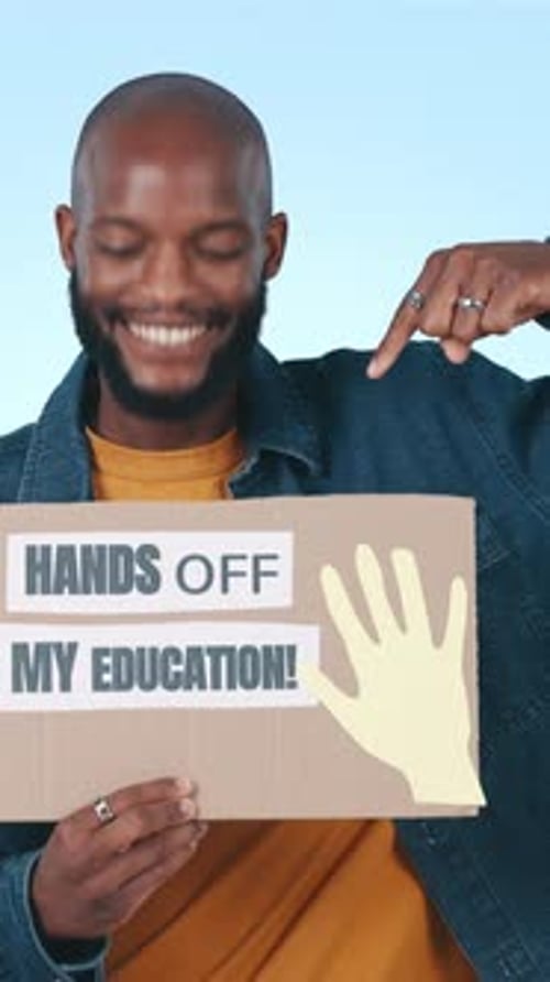 Face, black man and poster for protest, pointing and hands off my education on blue studio