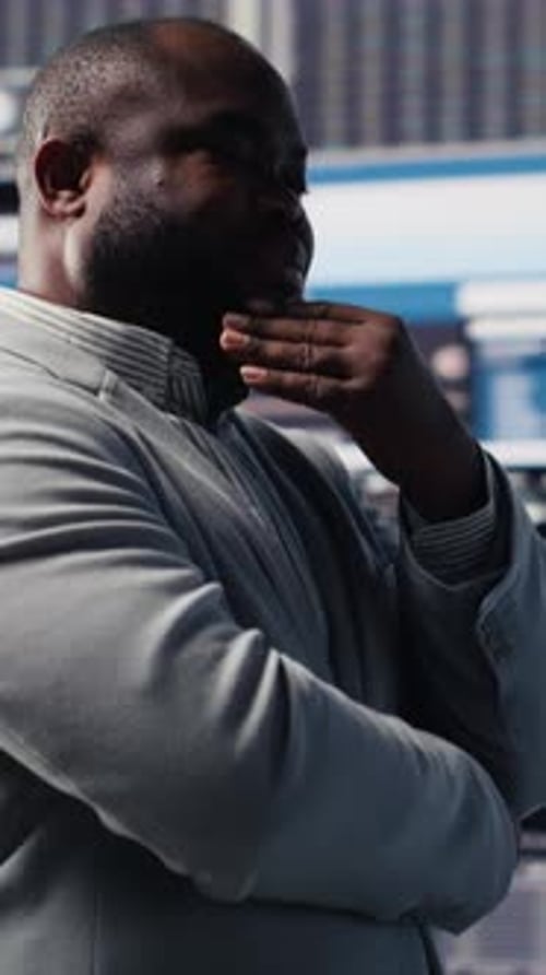 Vertical Video Modern Black Entrepreneur Thinking About New Powerful Ideas to Obtain Funds