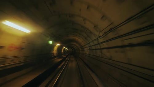 Fast to Go Through the Tunnel Underground the Lights of the Lanterns Flash Past